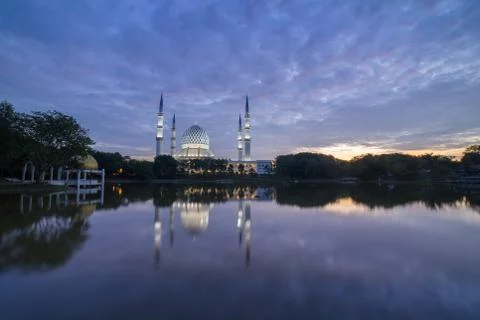 Sunrise over the mosque. Stock Photos
