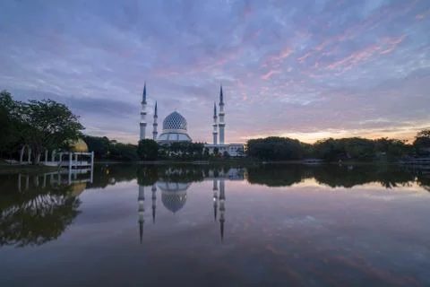 Sunrise over the mosque. Stock Photos