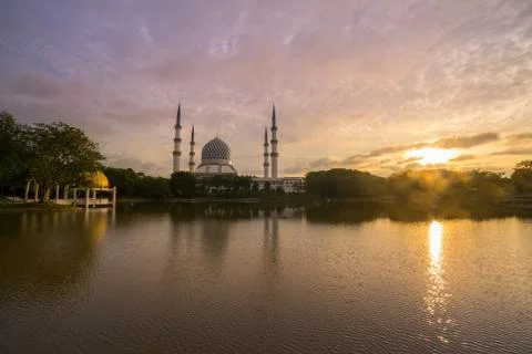 Sunrise over the mosque. Stock Photos