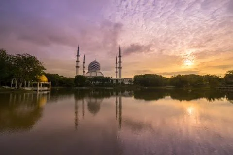 Sunrise over the mosque. Stock Photos