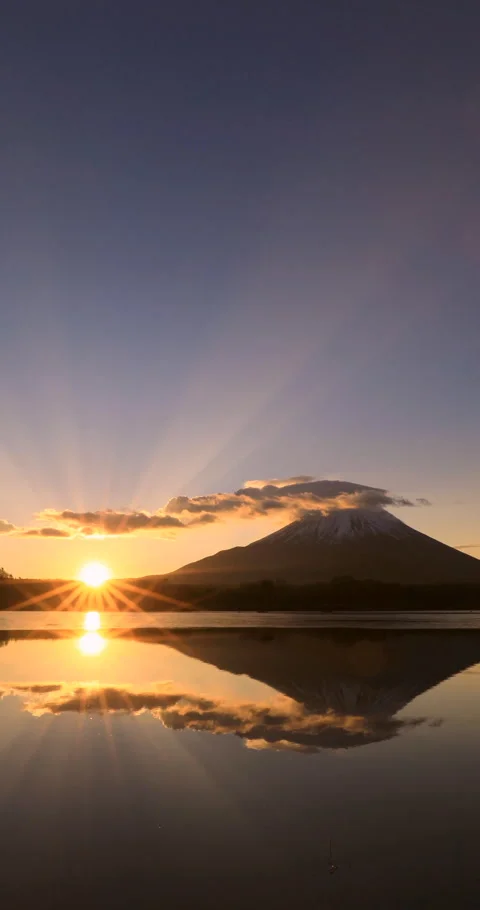 Sunrise over Mount Fuji and Rays of Light from Lake Shoji Stock Footage 332395878