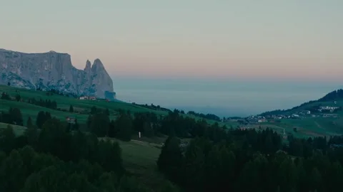 Sunrise over the Mountain Landscape Featuring Lush Green Alpine Meadows Stock Footage 331168817