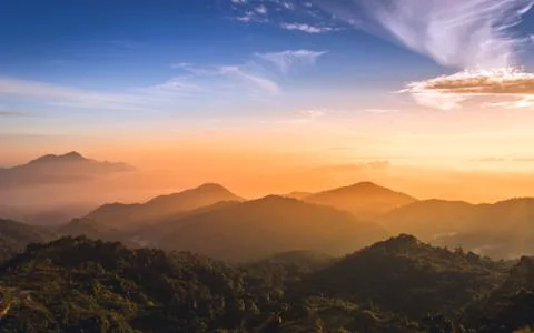 Sunrise over the mountain Stock Photos