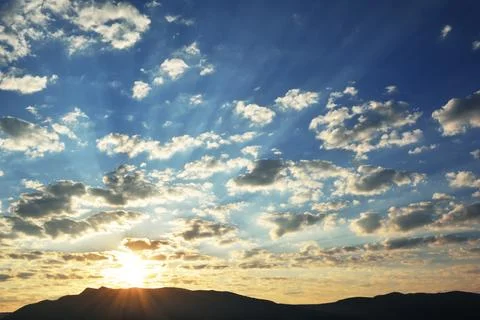 Sunrise over the mountain range Stock Photos