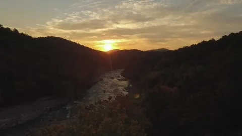 Sunrise Over Mountain River in Broken Bow Oklahoma Aerial Stock Footage 329329735