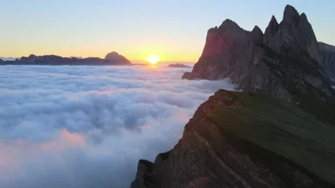 Sunrise over mountains above the clouds in Dolomites region Video stock 320340997