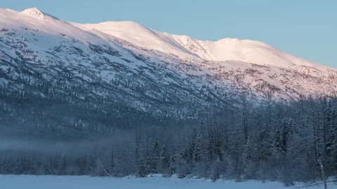 Sunrise over mountains in Alaska time-lapse Stock Footage 240424013