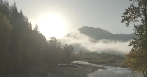 SUNRISE OVER MOUNTAINS and RIVER Stock Footage 165244504