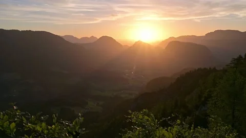 Sunrise over the mountains in Unken, Salzburg, Austria Stock Footage 201001153