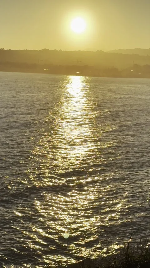 Sunrise over the ocean. Vertical video. Stock Footage 298996448