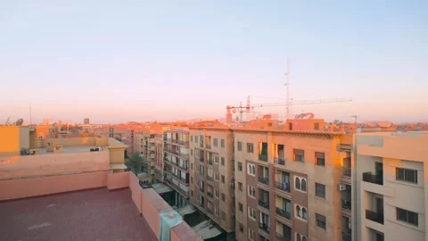 Sunrise Over Residential Rooftops In Marrakech With Satellite Dishes And Urban Video stock 302906056