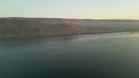 Sunrise over the river and freight rain Stock Footage 248001963