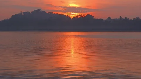 Sunrise over River and Rainforest in the Amazon. Stock Footage 72763103