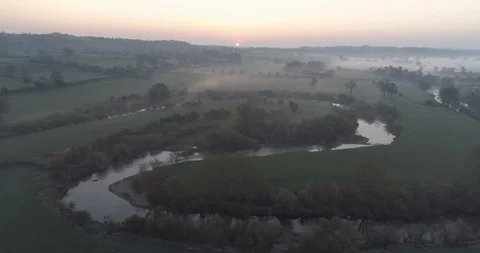 Sunrise over river bend Stock Footage 114037986