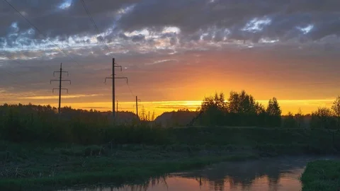 Sunrise over the river with clouds Stock Footage 76041270