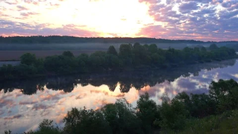 Sunrise over the river Stock Footage 276343746