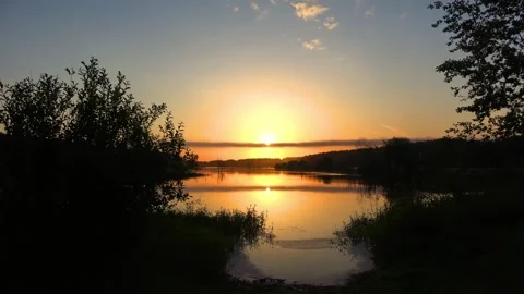 Sunrise over the river Stock Footage 276876435