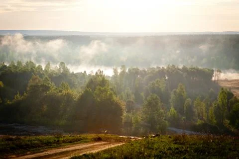 Sunrise over the river Stock Photos