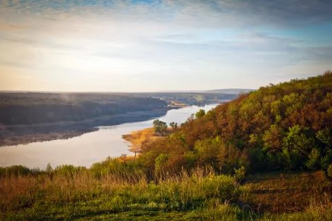 Sunrise over the river Stock Photos