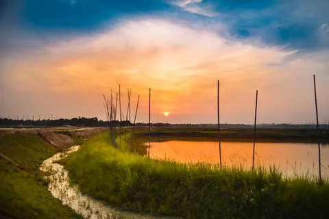 Sunrise over the river Stock Photos