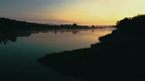 Sunrise over the river. Сlouds over the river. Stock Footage 173046718