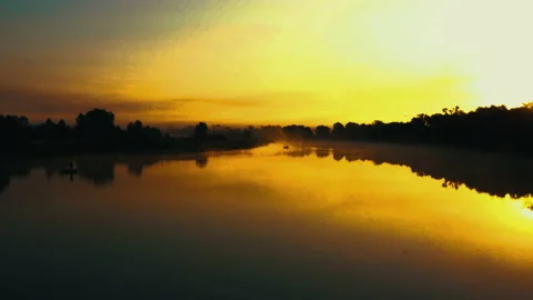 Sunrise over the river. Сlouds over the river. Stock Footage 173067118