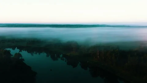 Sunrise over the river. Сlouds over the river. Stock Footage 173068979