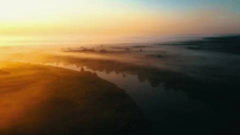 Sunrise over the river. Сlouds over the river. Stock Footage 173103555