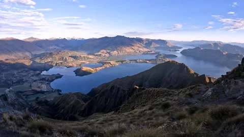 Sunrise Over Roys Peak: Panoramic View of Lake Wanaka and Southern Alps, Ne.. Stock Footage 295011878
