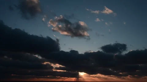 Sunrise over sea, dramatic clouds, time lapse Stock Footage 51142101