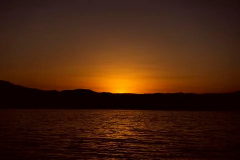 Sunrise over the sea Stock Photos