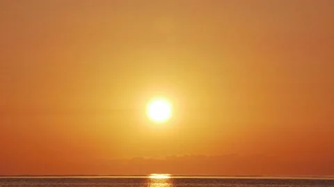 Sunrise over the sea timelapse. Dramatic gold dawn scene Stock Footage 154429224