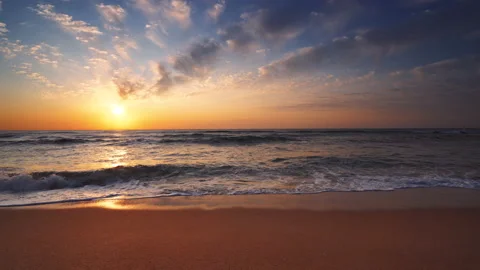 Sunrise over the sea. Tropical island  and ocean waves on the beach. Stock Footage