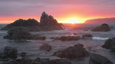 Sunrise over the seashore with cliffs Stock Footage 222625330