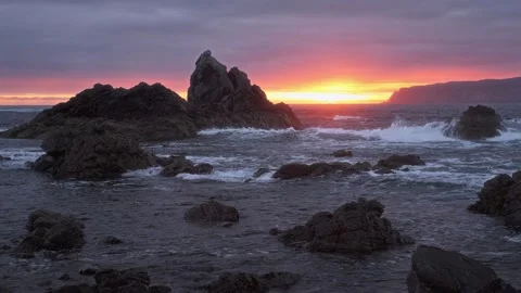 Sunrise over the seashore with cliffs Stock Footage 267885794