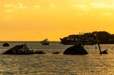 Sunrise over a Ship Graveyard Stock Photos
