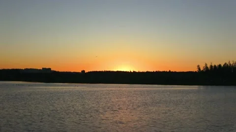 Sunrise over a small lake Stock Footage 279637832