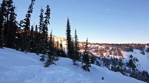 Sunrise over the Snow-Covered Slopes of the Skyline Trail, Mount Rainier Nationa Stock Footage 332143500