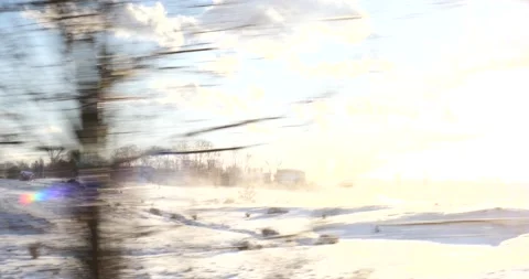 Sunrise over snow covered winter fields with lens flare Stock Footage 171908292