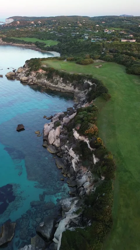 Sunrise over Sperone Cliffs and Turquoise Sea, Corsica - 4K Drone Aerial Video stock 328409315