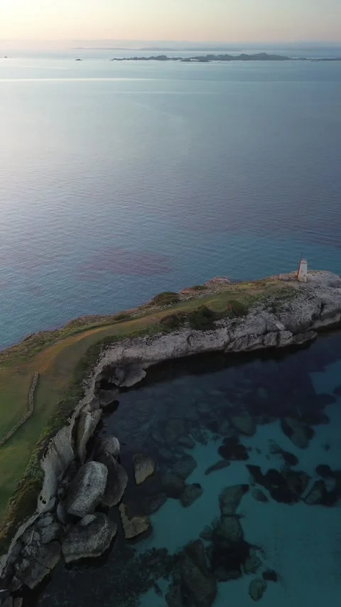 Sunrise over Sperone Cliffs and Turquoise Sea, Corsica - 4K Drone Aerial Stock Footage 328409360