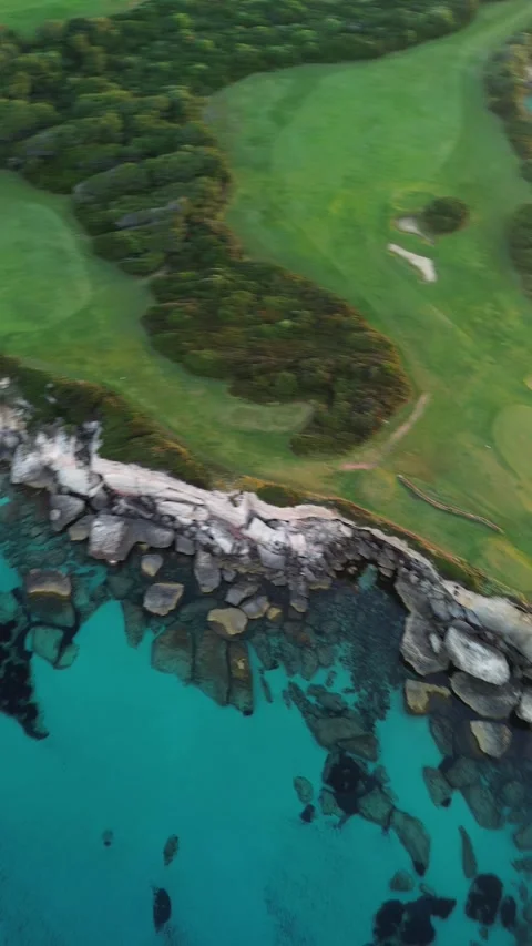 Sunrise over Sperone Cliffs and Turquoise Sea, Corsica - 4K Drone Aerial Video stock 328409525
