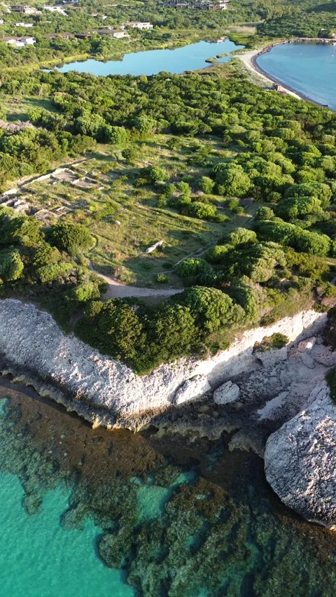 Sunrise over Sperone Cliffs and Turquoise Sea, Corsica - 4K Drone Aerial Video stock 328409740
