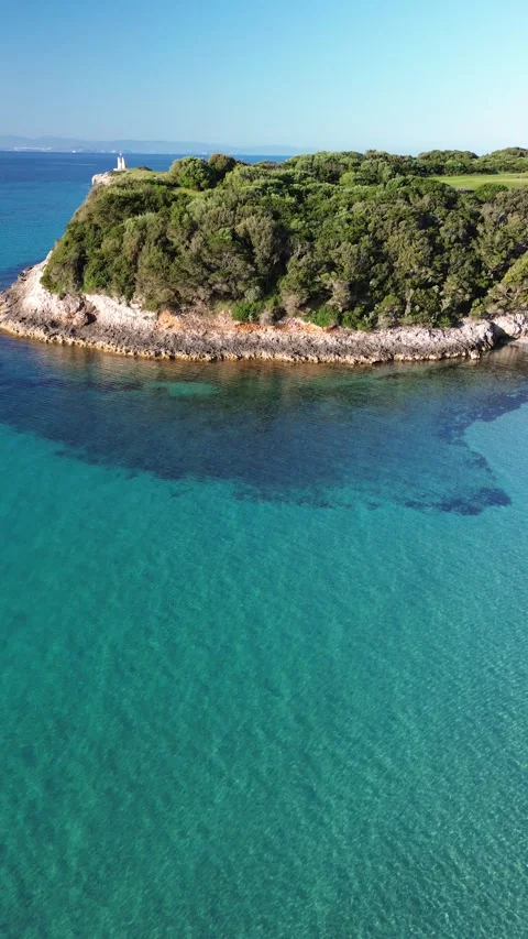 Sunrise over Sperone Cliffs and Turquoise Sea, Corsica - 4K Drone Aerial Stock Footage 328409892