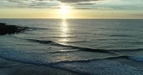 Sunrise over surf beach Stock Footage 96007983