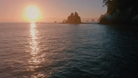 Sunrise over a tranquil coastal setting Video stock 148077089