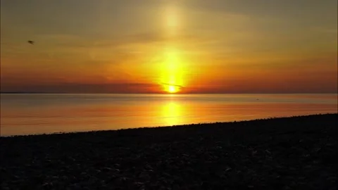 Sunrise over tranquil shore Video stock 196177528