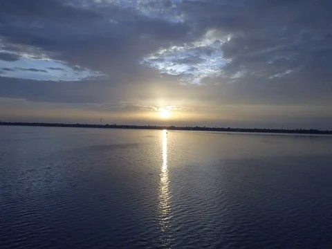 Sunrise over water Stock Footage 80682578
