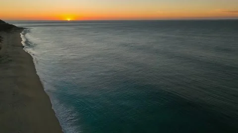 Sunrise over the water moving backwards Stock Footage 236742014