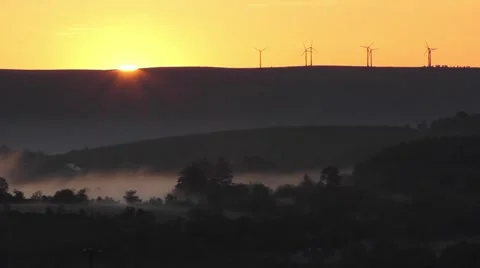 Sunrise over the wind farm Stock Footage 64374936